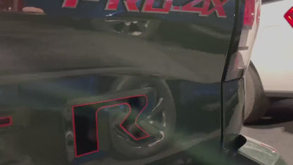 Gloss Black Tailgate Letters Outlined in Lava